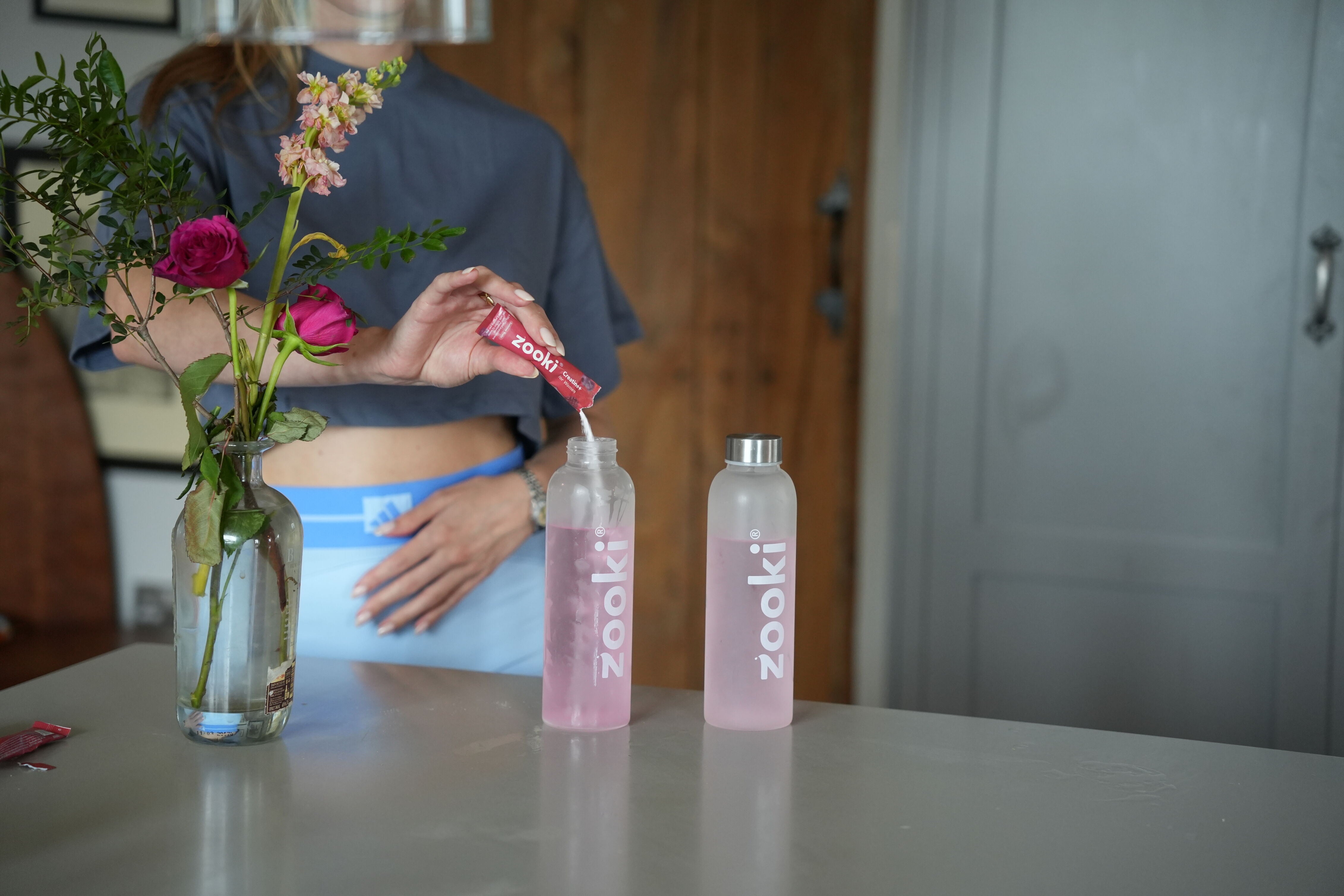 Woman feeling energised and lean after taking creatine for women supplement