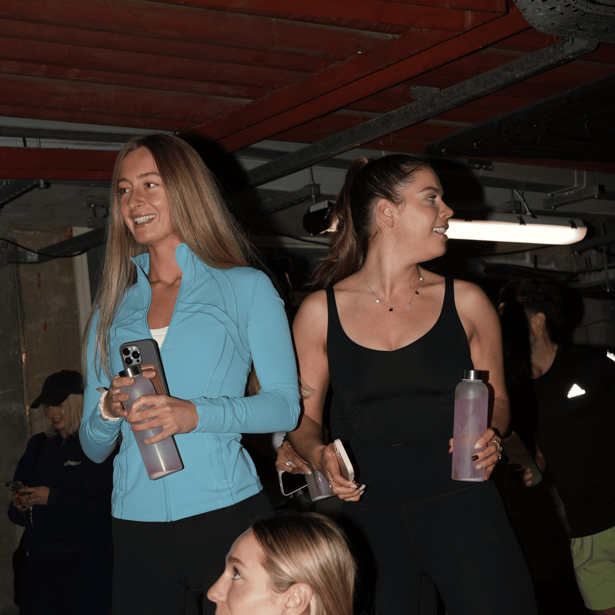 Woman taking creatine to support energy, mood, and overall wellness without bulking or gaining muscle.